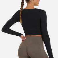 Langärmliges, ausgehöhltes, kurzes, langärmliges Sporttop